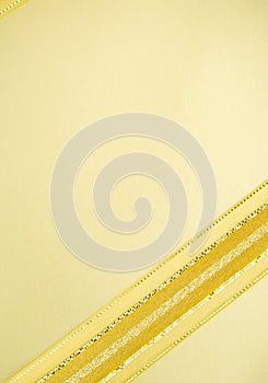 Golden ribbon on yellow space