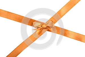 Golden ribbons with beautiful bow on white background