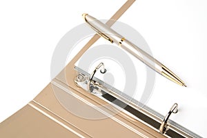 Golden ring binder and pen