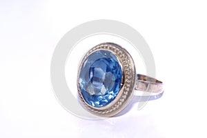 Golden ring with blue aquamarine