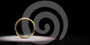 Golden Ring Frame Spotlighted on Black Background 3D Illustration photo