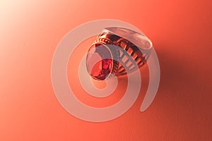 Golden ring with ruby isolated background