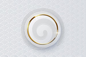 Golden ring on white button isolated on pattern