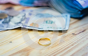 Golden rings and dollar banknotes