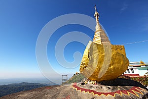 Golden rock a Buddhist pilgrimage site, Myanmar photo