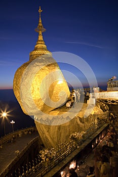 Golden rock at night