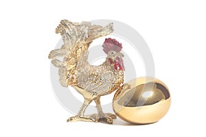 Golden rooster with golden egg