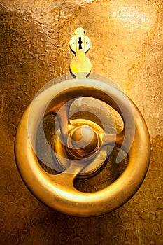 Golden safe deposit box with handle and lock