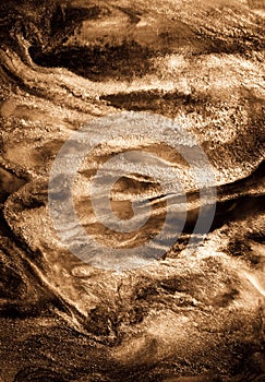 Golden sand abstract resin art swirl luxury background. Liquid