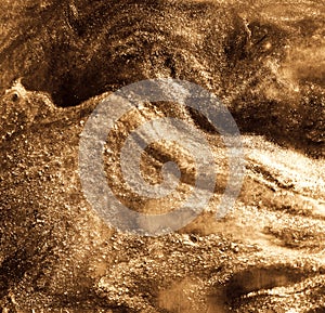 Golden sand abstract resin art swirl luxury background. Liquid