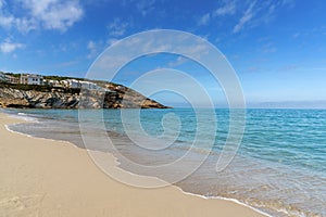 golden sand beach and cleaer turquoise waters at Cala Mesquida beach in eastern Mallorca