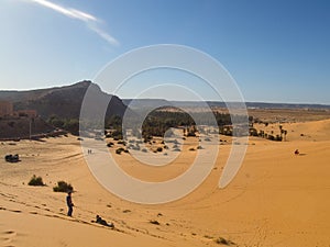 Golden sand dunes in the Algerian desert, the city of Bechar Taghit