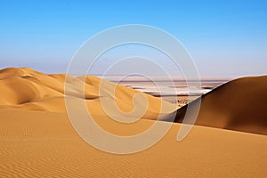 Golden sand dunes in central desert of Iran