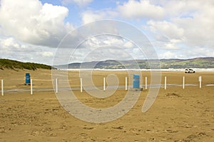 The golden sands of the deserted beach at Benone in County Londonderry on the North Coast of Ireland