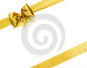 Golden satin gift bow. Ribbon