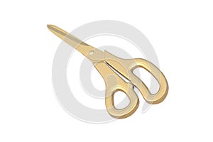 Golden scissors isolated on white background