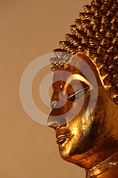 Golden sculpture of Buddha, inside the Grand Palace complex in Bangkok, Thailand