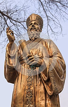 Golden sculpture of a Catholic spiritual leader