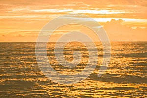 Golden sea in sunset background