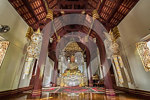 The Golden seated presiding Buddha in Phra That Chom Kitti temple, Chiang Saen, Thailand,