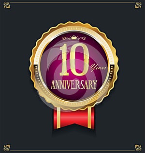 Golden shield and laurel wreath anniversary  10 years