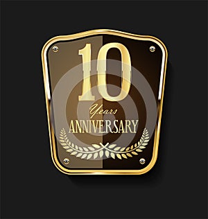 Golden shield and laurel wreath anniversary  10 years