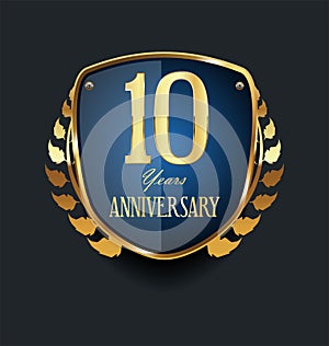 Golden shield and laurel wreath anniversary  10 years