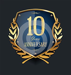 Golden shield and laurel wreath anniversary  10 years