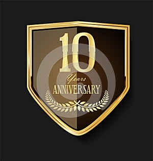 Golden shield and laurel wreath anniversary  10 years