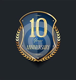 Golden shield and laurel wreath anniversary  10 years