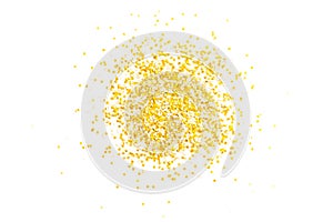 Golden shiny confetti on a white background.