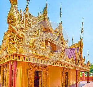 The golden shrine in Kyauktawgyi Pagoda, Mandalay, Myanmar