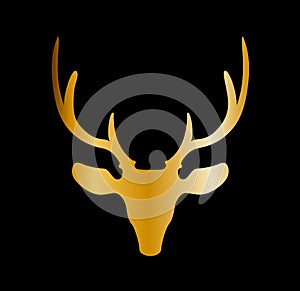 Golden silhouette of reindeer head with big horns isolated on bl