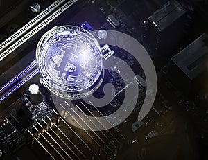 Golden and Silver Bitcoins on Electronics