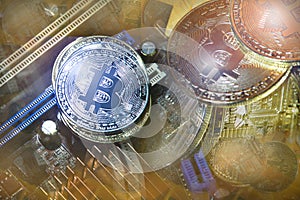 Golden and Silver Bitcoins on Electronics