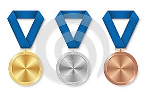 Golden silver and bronze award sport medal with blue ribbons