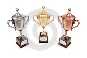 Golden, silver and bronze trophy cups on white background. 3D re