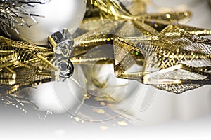 Golden and silver christmas balls and stars background