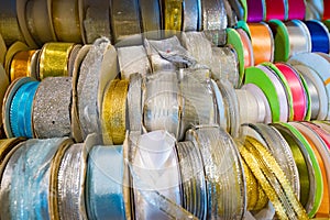 Golden, silver and colourful tapes on sale