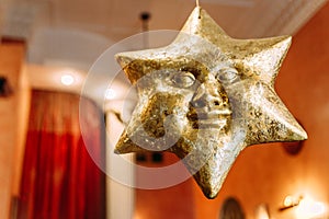 Golden smiling star for decor