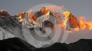 golden snow mountain sunset in the Himalayas