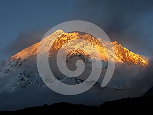 golden snow mountain sunset in Nepal