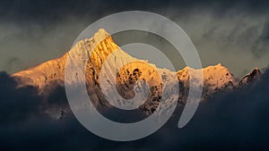 Golden snow mountain sunset in Tibet