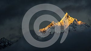 Golden snow mountain sunset in Tibet