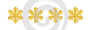 Golden snowflake. Icon of a snow flake made of a golden foil