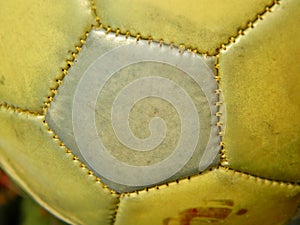 Golden soccer ball, close up shot