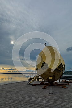 Golden Solar Egg Sauna near Lake, Sweden