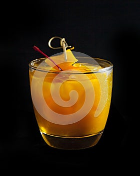 Golden Sour alcohol cocktail made of scotch whiskey mango puree hohey syrup egg white and lime juice