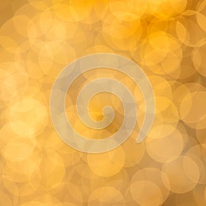 Golden sparkling lights festive background. Abstract twinkled bright bokeh glitter card