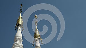 Golden Spires of Mon Style Pagoda in Wat Chomphuwek Ancient Buddhist Temple, Thailand